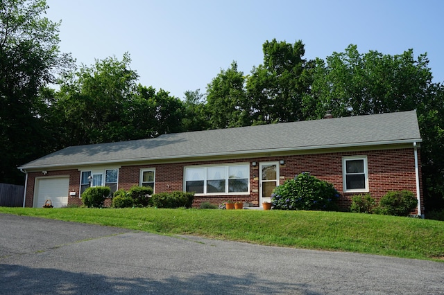 520 S Poplar St, Vinton, VA 24179 - single story home with brick siding, an attached garage, and a front yard