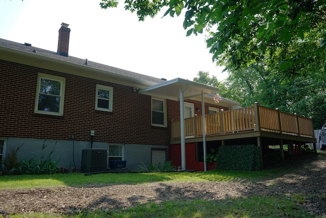 520 S Poplar St, Vinton, VA 24179 - back of house with brick siding, a wooden deck, and a chimney
