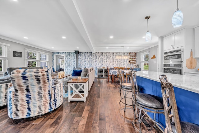 10610 Slings Gap Rd, Bent Mountain, VA 24059 - living area with dark wood finished floors, ornamental molding, a wood stove, and recessed lighting
