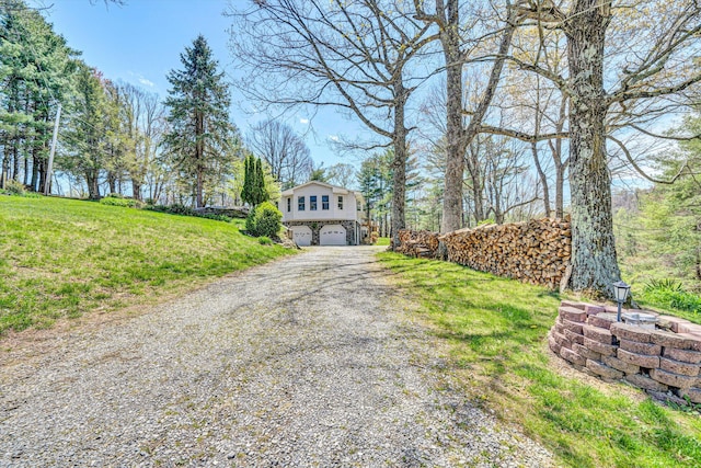 10610 Slings Gap Rd, Bent Mountain, VA 24059 - view of front of home featuring a garage, driveway, and a front yard