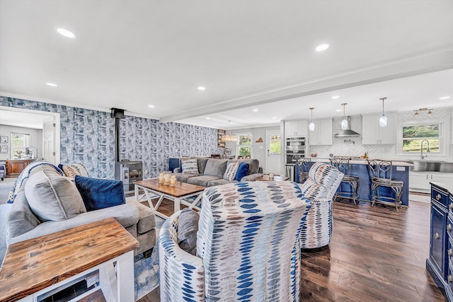 10610 Slings Gap Rd, Bent Mountain, VA 24059 - living area featuring a wood stove, dark wood-type flooring, wallpapered walls, and recessed lighting