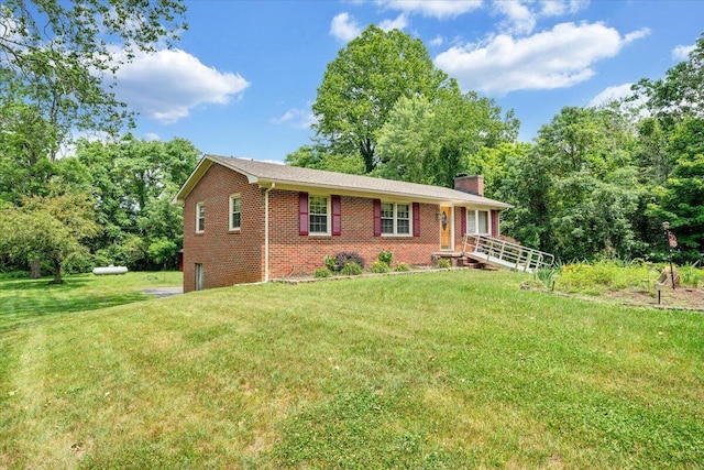 3203 Bradshaw Rd, Salem, VA 24153 - ranch-style home with a chimney, brick siding, and a front lawn