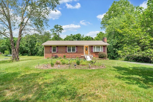 3203 Bradshaw Rd, Salem, VA 24153 - ranch-style home with a chimney, a front yard, and brick siding