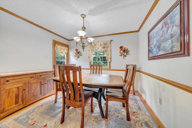 3203 Bradshaw Rd, Salem, VA 24153 - dining space with a chandelier, ornamental molding, and a textured ceiling