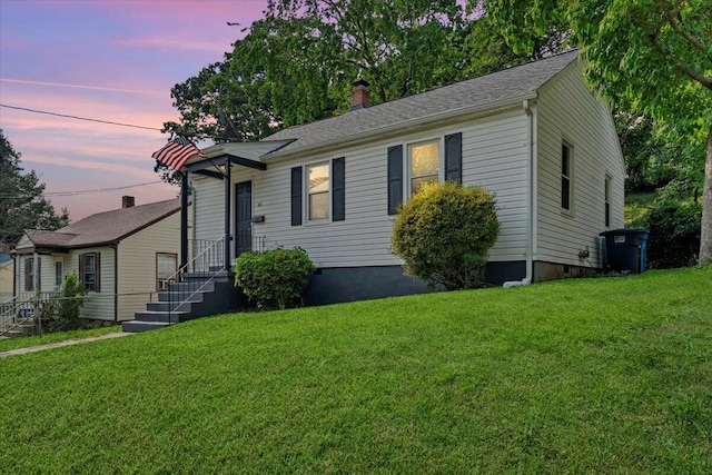 66 Forest Hill Ave NE, Roanoke, VA 24012 - view of front facade featuring a lawn and a chimney