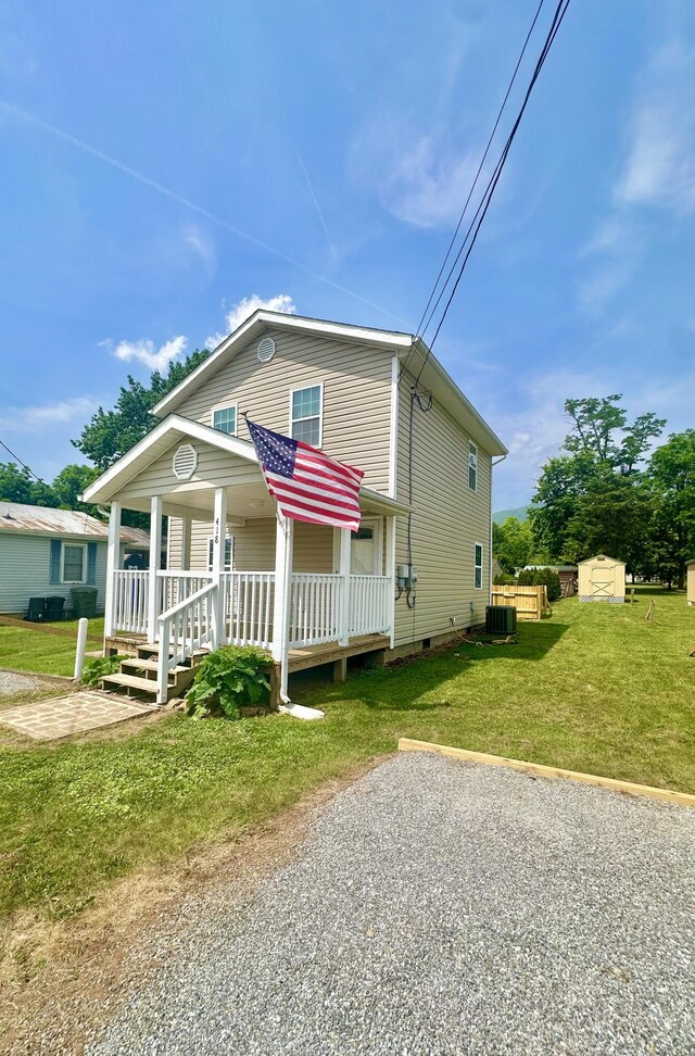418 Marshall Ave, New Castle, VA 24127 - view of front of home featuring a porch, crawl space, and a front lawn