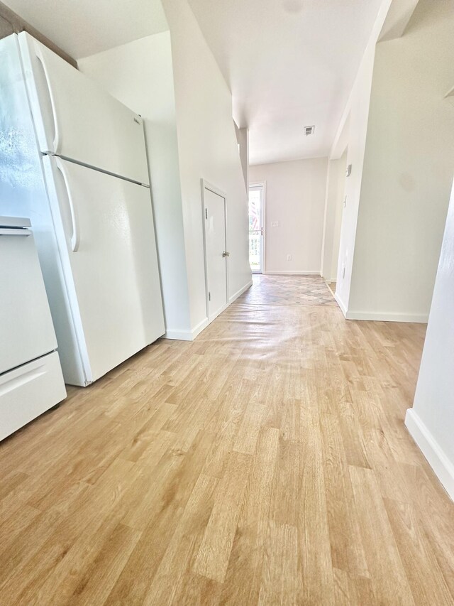 418 Marshall Ave, New Castle, VA 24127 - corridor featuring light wood-style flooring and baseboards