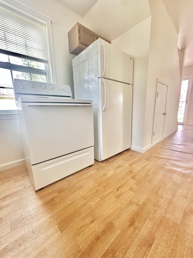 418 Marshall Ave, New Castle, VA 24127 - kitchen featuring white appliances and light wood-style flooring