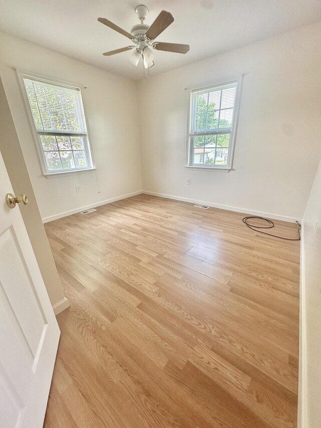 418 Marshall Ave, New Castle, VA 24127 - empty room featuring light wood-type flooring and ceiling fan