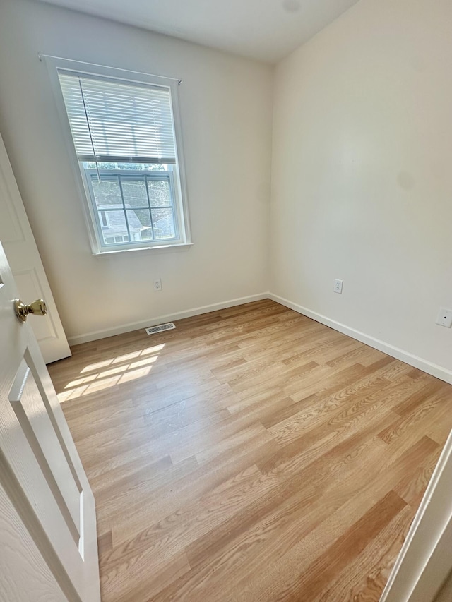 418 Marshall Ave, New Castle, VA 24127 - unfurnished room featuring light wood-type flooring and baseboards