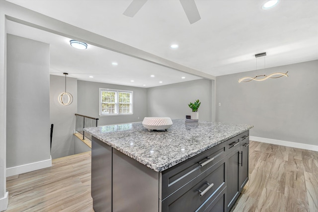 3631 Bower Rd, Roanoke, VA 24018 - kitchen with light wood finished floors, light stone countertops, a center island, decorative light fixtures, and recessed lighting