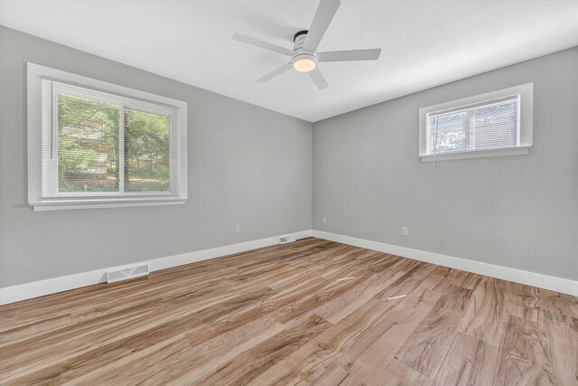 3631 Bower Rd, Roanoke, VA 24018 - unfurnished room featuring plenty of natural light, wood finished floors, and a ceiling fan