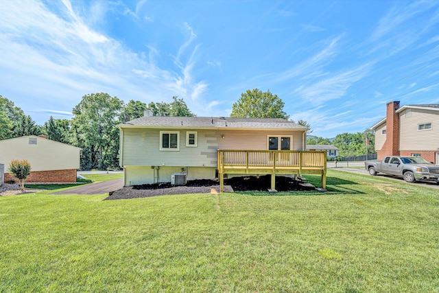 3631 Bower Rd, Roanoke, VA 24018 - rear view of house with a lawn, a chimney, and a wooden deck