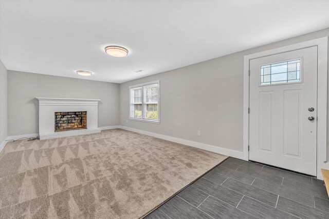 3631 Bower Rd, Roanoke, VA 24018 - foyer entrance featuring plenty of natural light, a fireplace, and carpet
