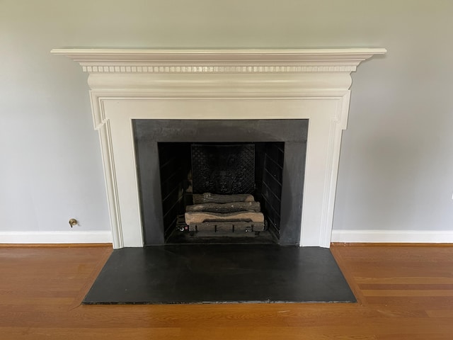 3210 Orchard Hill Rd SW, Roanoke, VA 24018 - detailed view of a fireplace and wood finished floors
