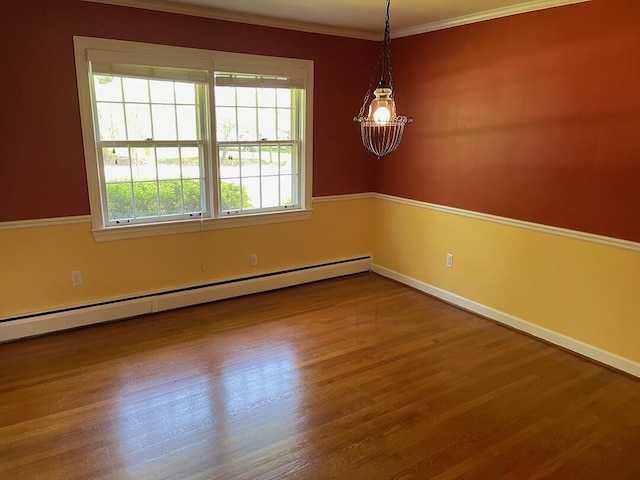 3210 Orchard Hill Rd SW, Roanoke, VA 24018 - empty room with a baseboard heating unit, wood finished floors, and ornamental molding