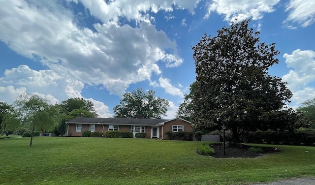 3210 Orchard Hill Rd SW, Roanoke, VA 24018 - ranch-style home with a front yard and brick siding