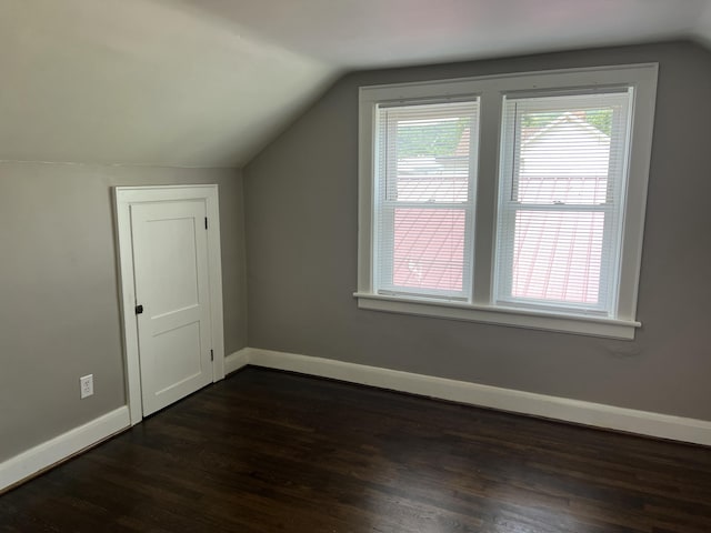 115 E Walnut St, Covington, VA 24426 - bonus room with vaulted ceiling and dark wood finished floors