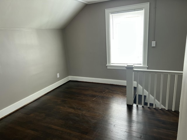 115 E Walnut St, Covington, VA 24426 - additional living space featuring dark wood-type flooring and vaulted ceiling