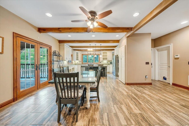 223 Moonriver Ln, Moneta, VA 24121 - dining room featuring healthy amount of natural light, french doors, light wood-style flooring, beam ceiling, and recessed lighting