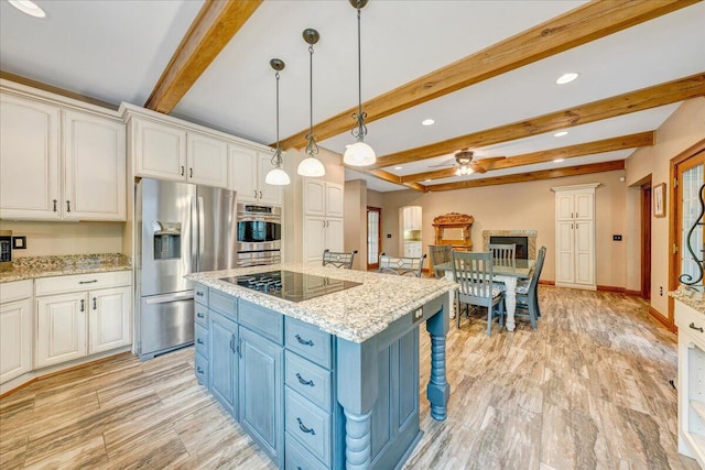 223 Moonriver Ln, Moneta, VA 24121 - kitchen with stainless steel fridge with ice dispenser, blue cabinetry, black electric cooktop, ceiling fan, and beamed ceiling