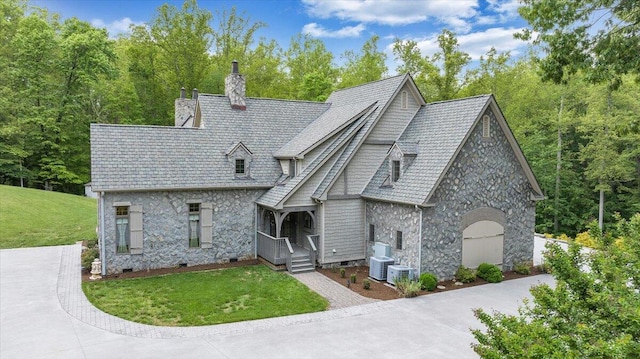 223 Moonriver Ln, Moneta, VA 24121 - view of front facade with stone siding, a front lawn, a chimney, and crawl space
