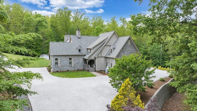 223 Moonriver Ln, Moneta, VA 24121 - view of front of house featuring a front yard, a chimney, and concrete driveway