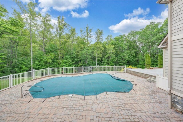 223 Moonriver Ln, Moneta, VA 24121 - view of pool with a patio area and a view of trees