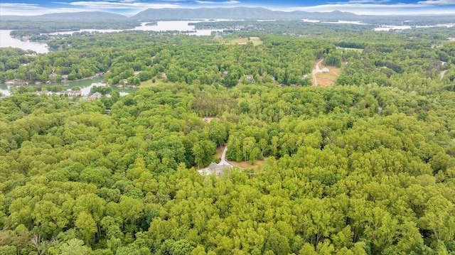 223 Moonriver Ln, Moneta, VA 24121 - drone / aerial view of a heavily wooded area and a water and mountain view