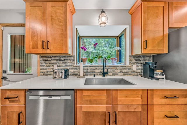 7102 Crown Rd, Roanoke, VA 24018 - kitchen featuring stainless steel dishwasher, tasteful backsplash, and light countertops