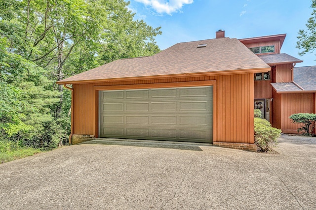 7102 Crown Rd, Roanoke, VA 24018 - garage featuring asphalt driveway