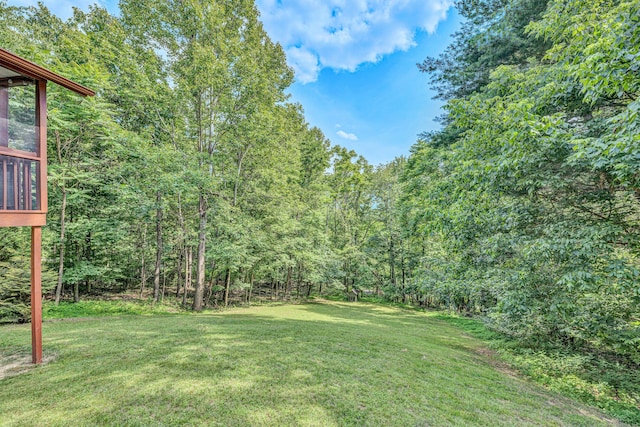 7102 Crown Rd, Roanoke, VA 24018 - view of green lawn featuring a wooded view