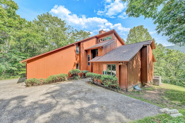 7102 Crown Rd, Roanoke, VA 24018 - view of front facade with a chimney and a shingled roof