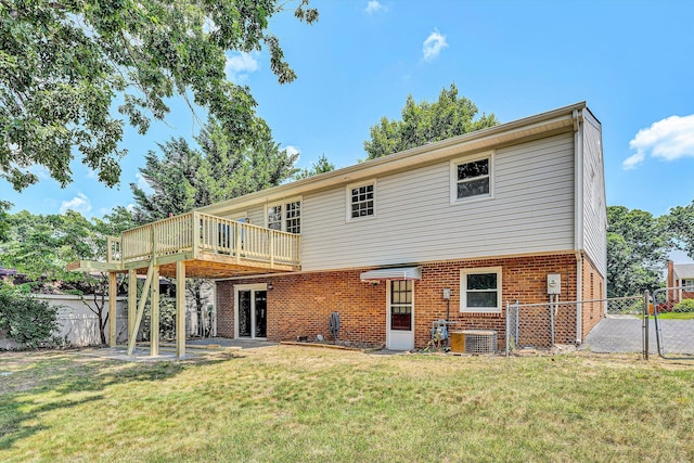 5428 Sweetfern Dr, Roanoke, VA 24019 - back of property with brick siding, a deck, and a gate