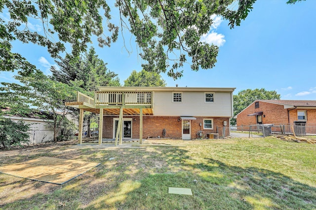 5428 Sweetfern Dr, Roanoke, VA 24019 - rear view of property featuring brick siding, a fenced backyard, a gate, and a deck