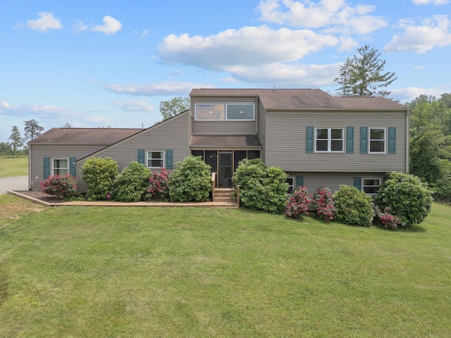 6000 Ferrum Mountain Rd, Callaway, VA 24067 - view of front of home featuring a front lawn, a sunroom, and a shingled roof