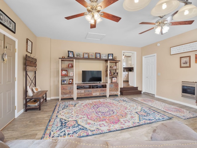 6000 Ferrum Mountain Rd, Callaway, VA 24067 - living area featuring a ceiling fan, heating unit, wood finished floors, and attic access