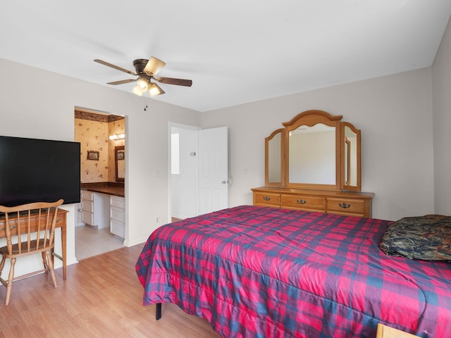 6000 Ferrum Mountain Rd, Callaway, VA 24067 - bedroom featuring wood finished floors, ceiling fan, and ensuite bathroom