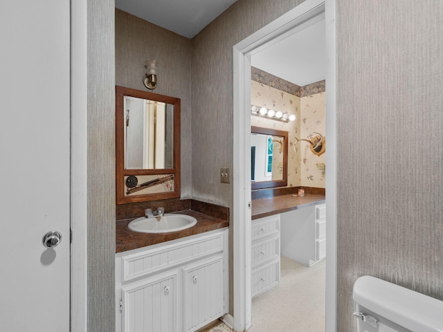 6000 Ferrum Mountain Rd, Callaway, VA 24067 - half bath featuring wallpapered walls and vanity