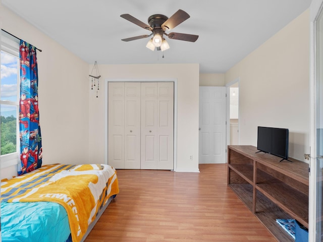 6000 Ferrum Mountain Rd, Callaway, VA 24067 - bedroom featuring light wood-type flooring, a closet, and a ceiling fan