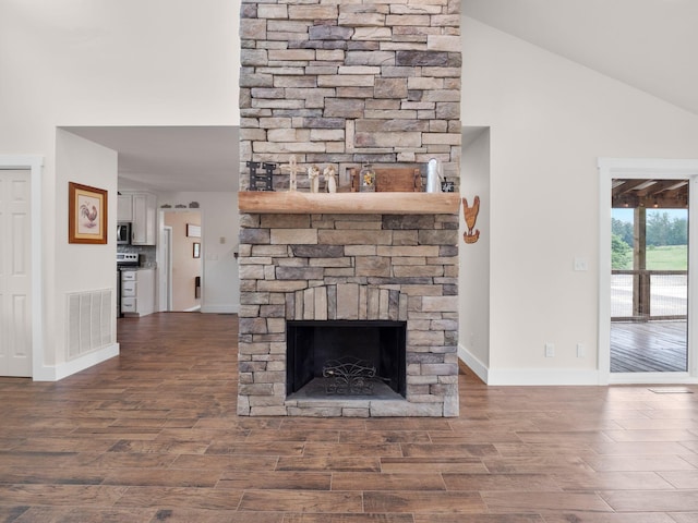 6000 Ferrum Mountain Rd, Callaway, VA 24067 - detailed view of stainless steel microwave, wood finished floors, and a fireplace