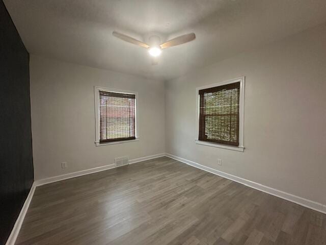 2327 Horsepasture Price Rd, Ridgeway, VA 24148 - empty room featuring dark wood-type flooring and ceiling fan