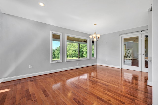 571 Cary Rd, Pilot, VA 24138 - spare room with a chandelier, hardwood / wood-style floors, french doors, and recessed lighting