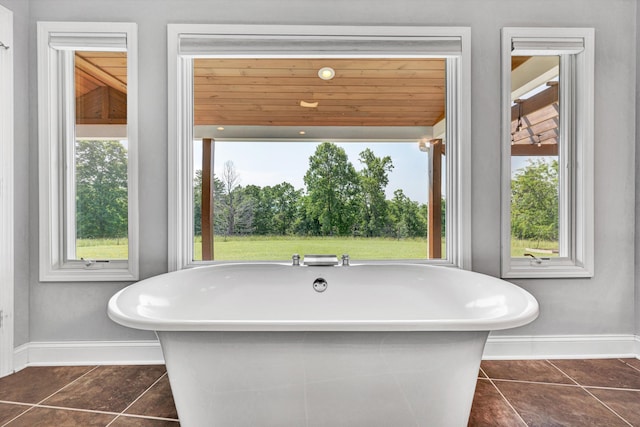 571 Cary Rd, Pilot, VA 24138 - full bath featuring a soaking tub and tile patterned floors