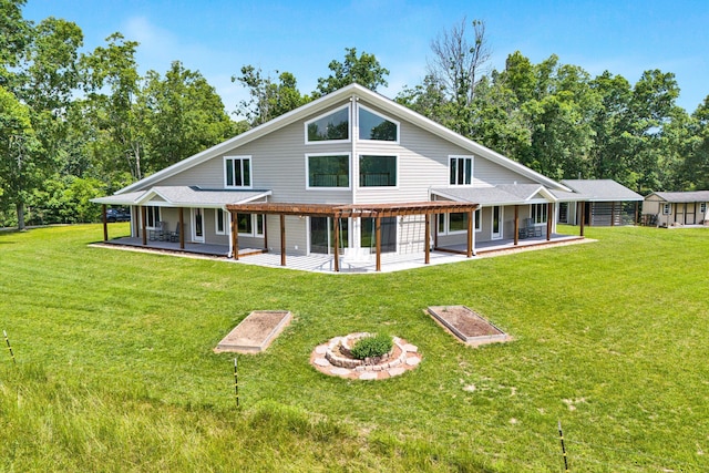 571 Cary Rd, Pilot, VA 24138 - rear view of property featuring a patio area, a lawn, and view of scattered trees