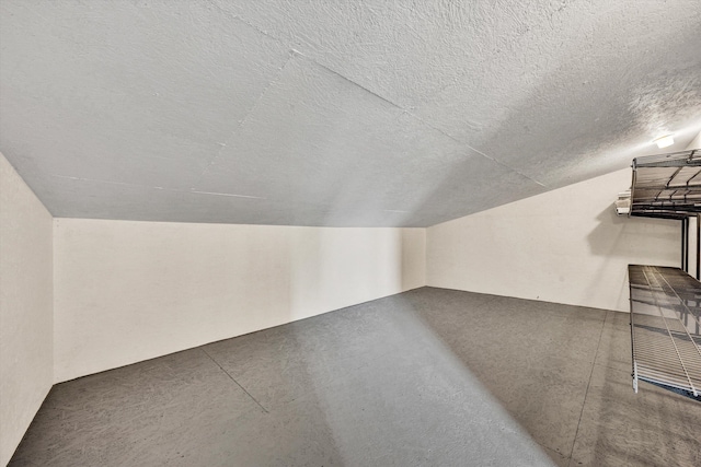 571 Cary Rd, Pilot, VA 24138 - additional living space featuring vaulted ceiling and a textured ceiling