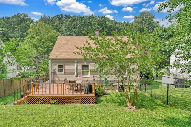 2728 Lansing Dr SW, Roanoke, VA 24015 - rear view of property featuring a fenced backyard, a deck, and a chimney