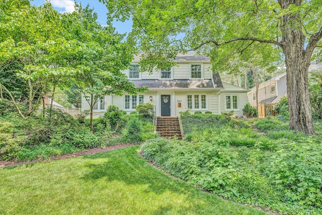 2410 Cornwallis Ave SE, Roanoke, VA 24014 - view of front of property featuring a front lawn, a shingled roof, and brick siding