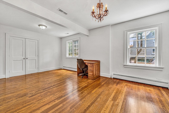 2410 Cornwallis Ave SE, Roanoke, VA 24014 - unfurnished living room featuring a baseboard radiator, hardwood / wood-style floors, a chandelier, and a desk
