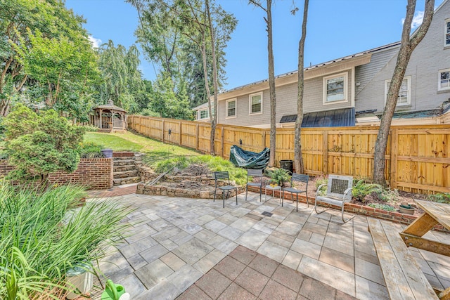2410 Cornwallis Ave SE, Roanoke, VA 24014 - fenced backyard with a gazebo and a patio area